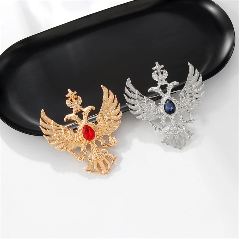 Broches insigne aigle à double tête en alliage de cristal pour femmes et hommes, épingles 2 couleurs, accessoires cadeaux, peuvent être portés à la fête de vacances