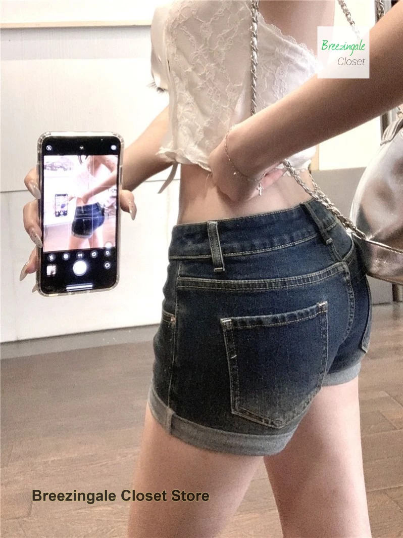 American retro fashion temperament rhinestone hemmed denim shorts female summer spice girl sexy low waist elastic bag hip pants