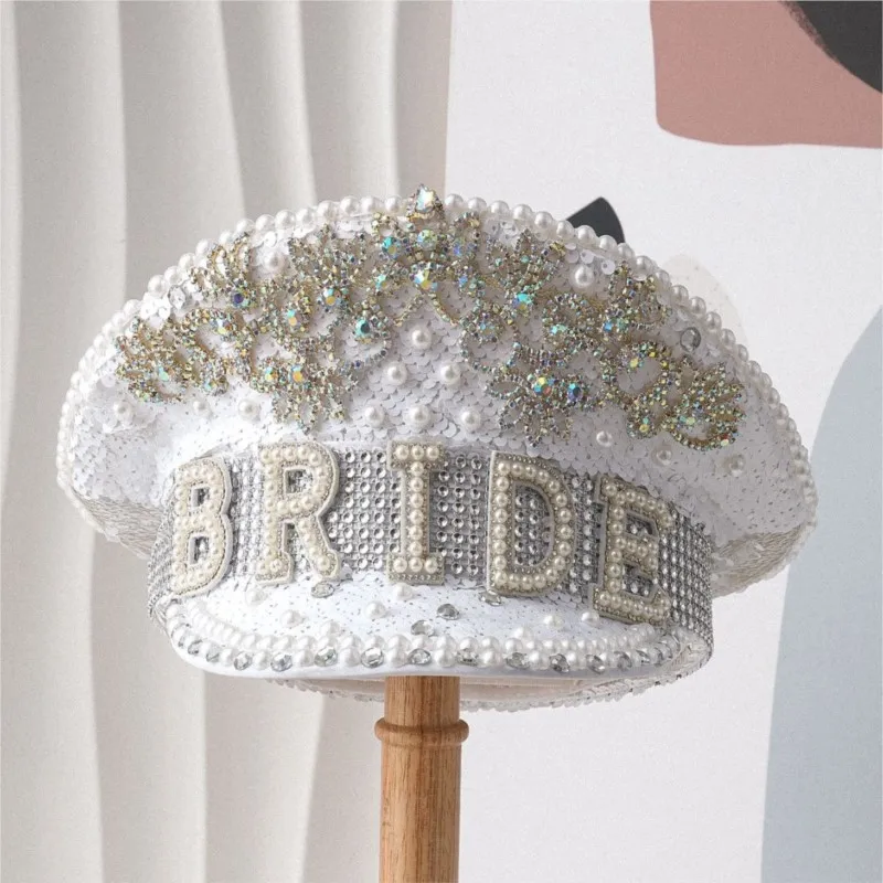 

New gender-neutral hat for women full of sequins and pearls inlaid with water flowers as a bridal