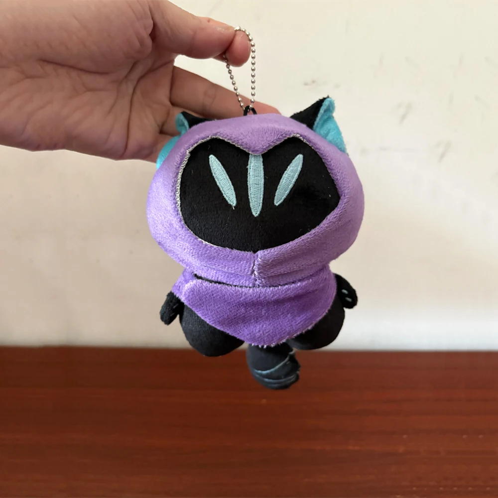 

Супермилая плюшевая игрушка-кот Омен из игры Valorant, 15 см, для школьного рюкзака, брелок-подвеска, забавная мультяшная плюшевая кукла