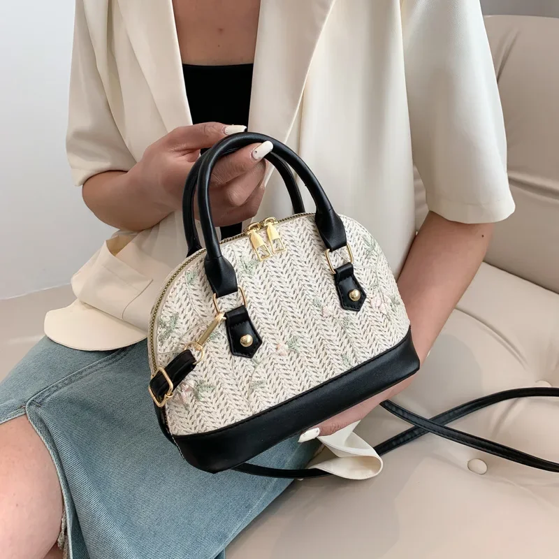 

Straw simple handbag shoulder messenger bag temperament gentle woven shell bag