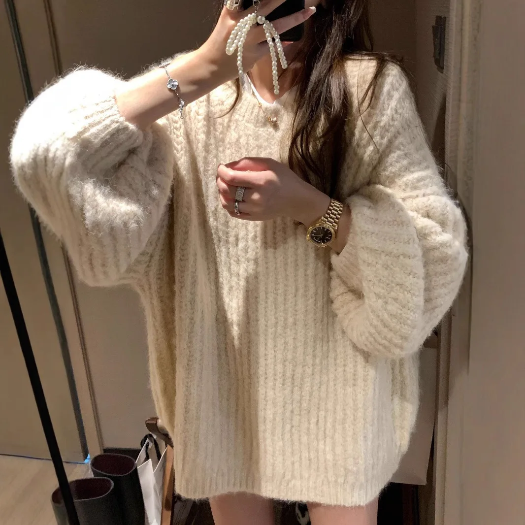 เสื้อสเวตเตอร์แขนทรงโคม คอกลมหลวมๆ สำหรับผู้หญิง สินค้าใหม่สำหรับฤดูใบไม้ร่วงและฤดูหนาว เสื้อถักสีพื้น ไซส์ใหญ่สำหรับผู้หญิง