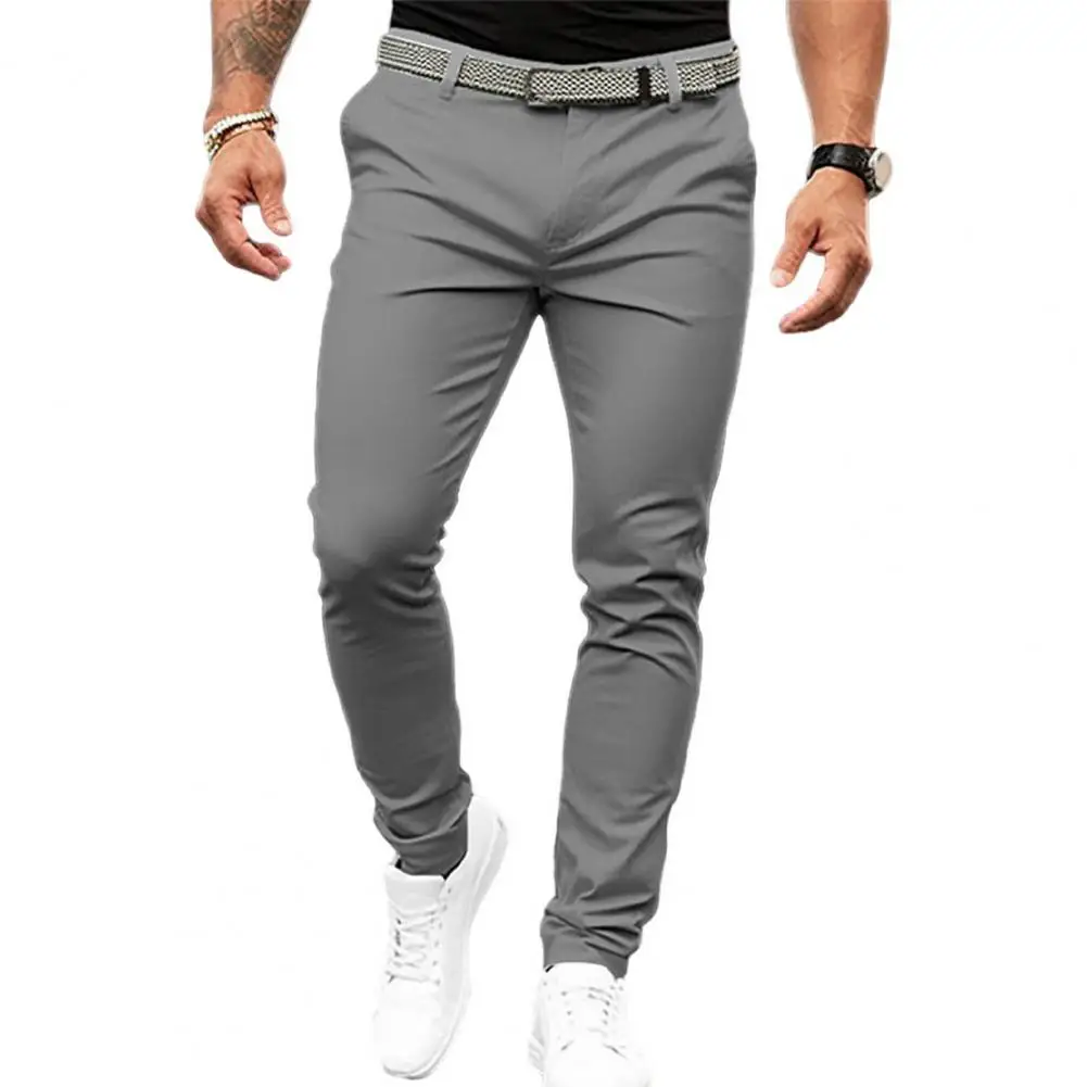 Pantalones de traje ajustados para hombre, pantalones de traje de Color sólido con tiro medio, bolsillos inclinados con cremallera, ropa de trabajo