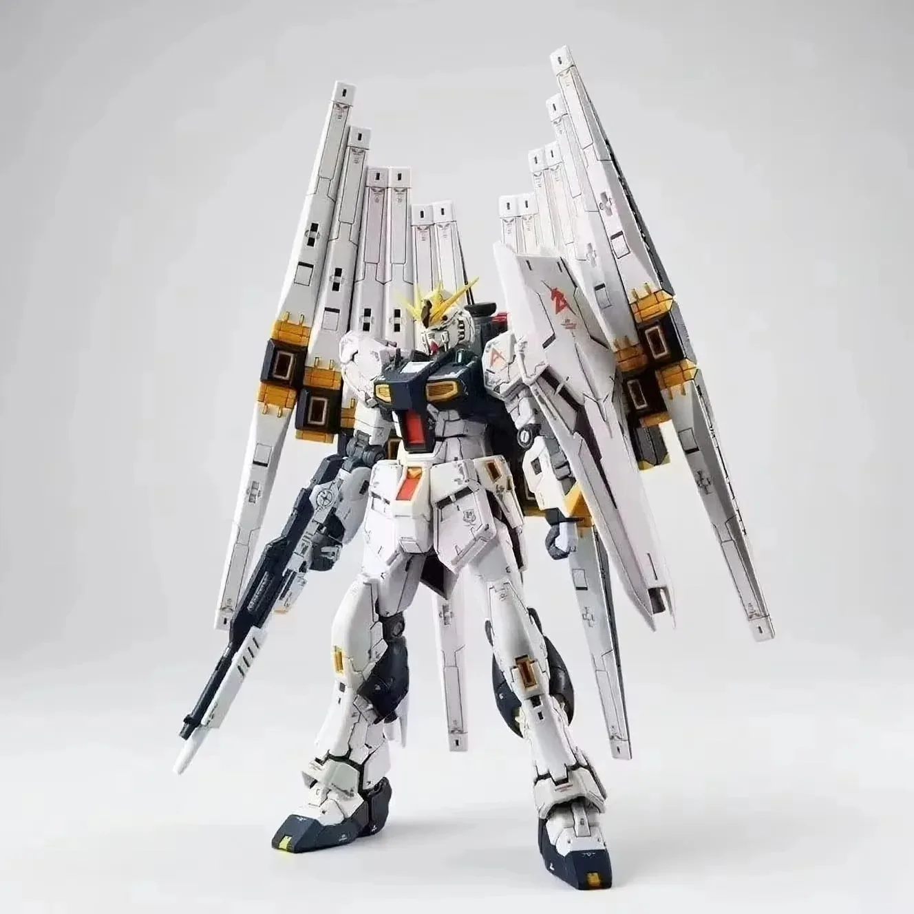 

Коллекционная модель RG 1/144 RX-93 V Fighter Nu: Аниме-меха с подставкой, наклейками и комплектом для сборки. Игрушка-робот для демонстрации и подарков.