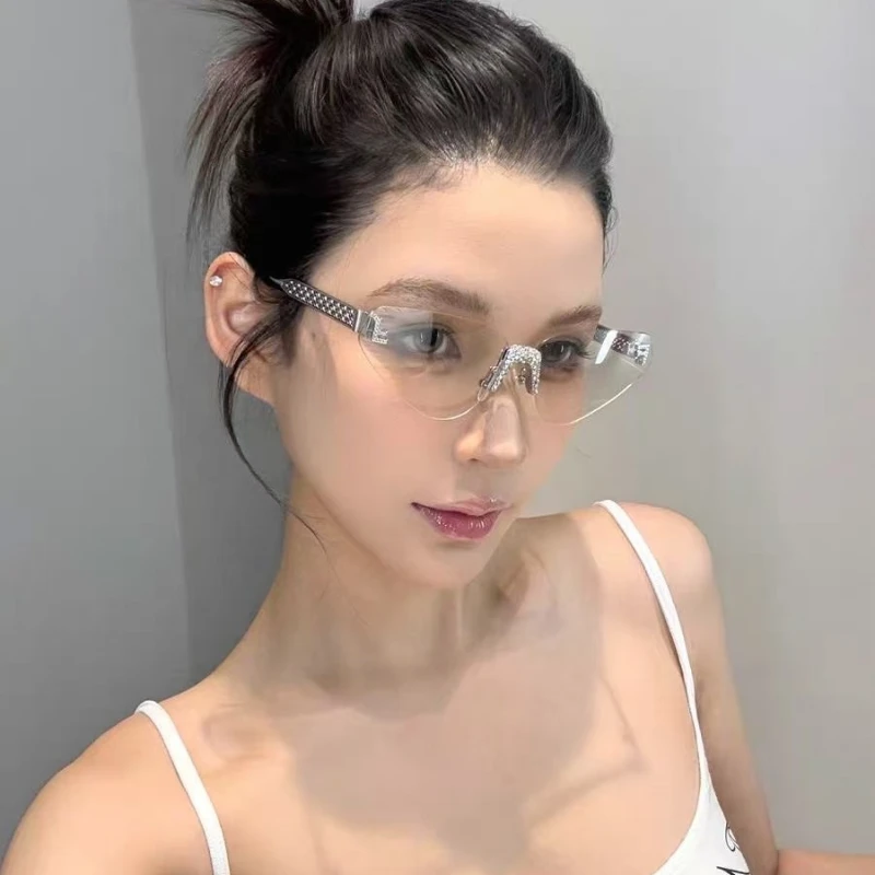 女性のセクシーなキャットアイリムレスラインストーンサングラス高級ブランドデザイナーレトロパンクメタル UV400 ドライビンググラス