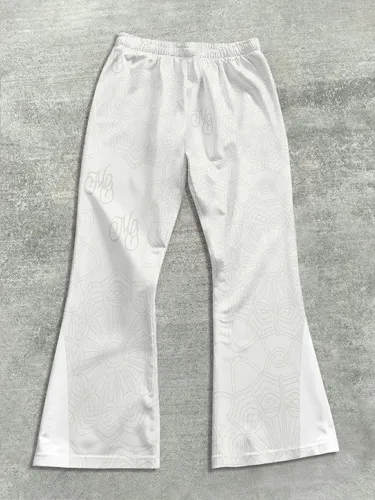Imagen 2 del producto Pantalones de chándal informales para hombre, estilo callejero, con estampado cruzado, a la moda, ligeramente acampanados, diseño de bloques de Color en blanco y negro