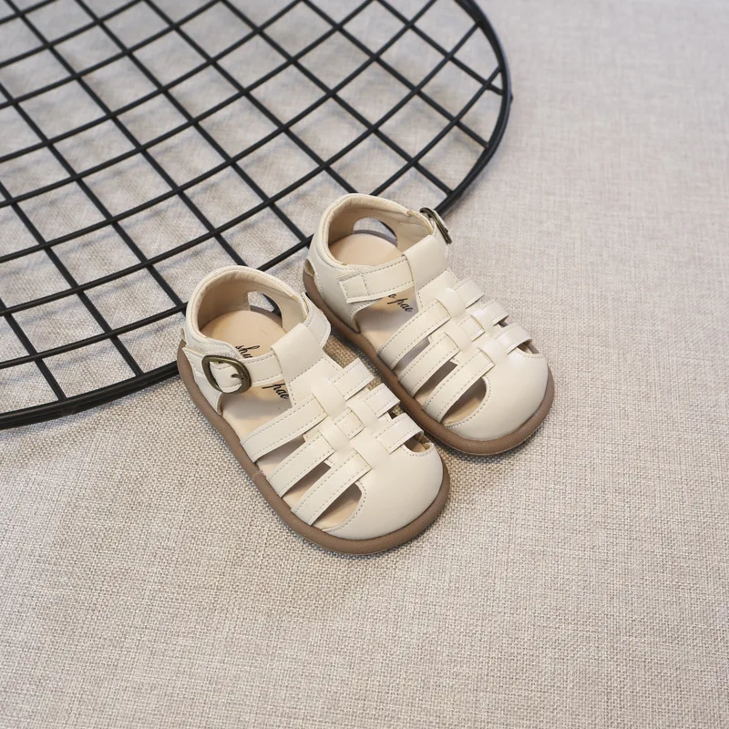 Sandalias Baotou para niños y niñas, zapatos romanos de Velcro, cómodos, tejidos, huecos, novedad de verano, 2024