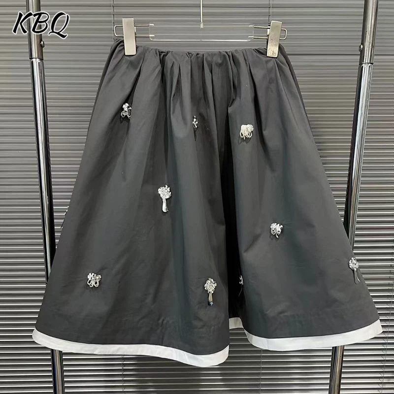 

KBQ Hit Color Spliced Appliques A Line Skirts for Women High Waist Temprament Spliced Folds Long Skirts Female Autumn Stye New