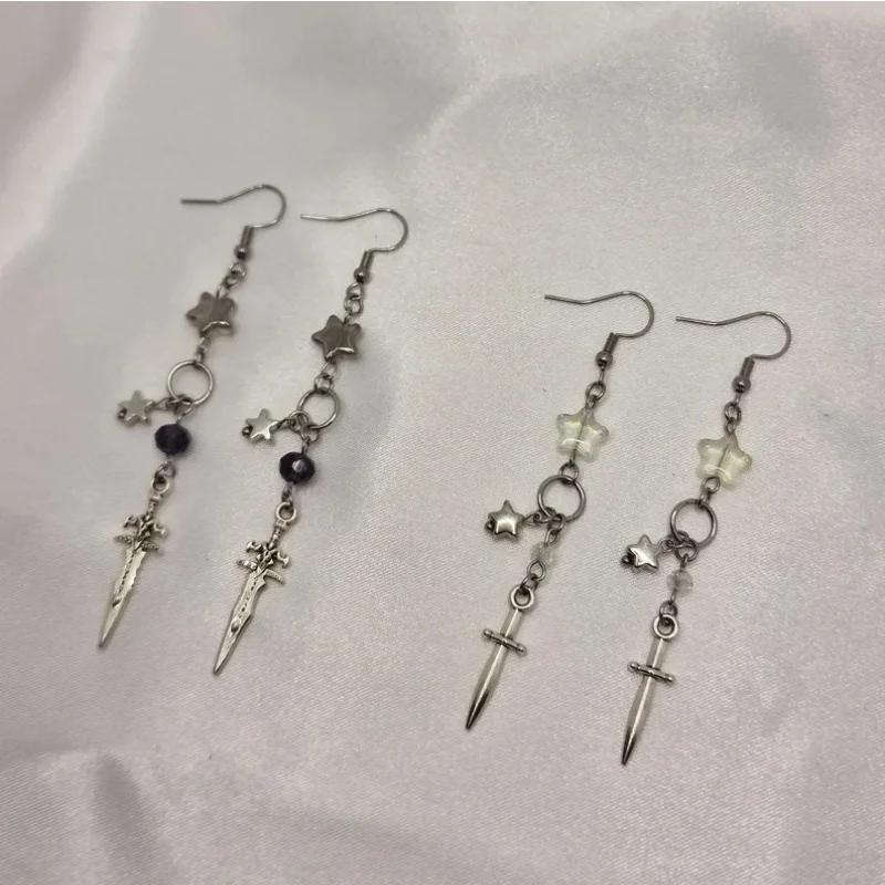 Y2K sword and star earrings, pendants with specific colors. Handmade. Friendship. Aesthetics (almost) anything is possible!