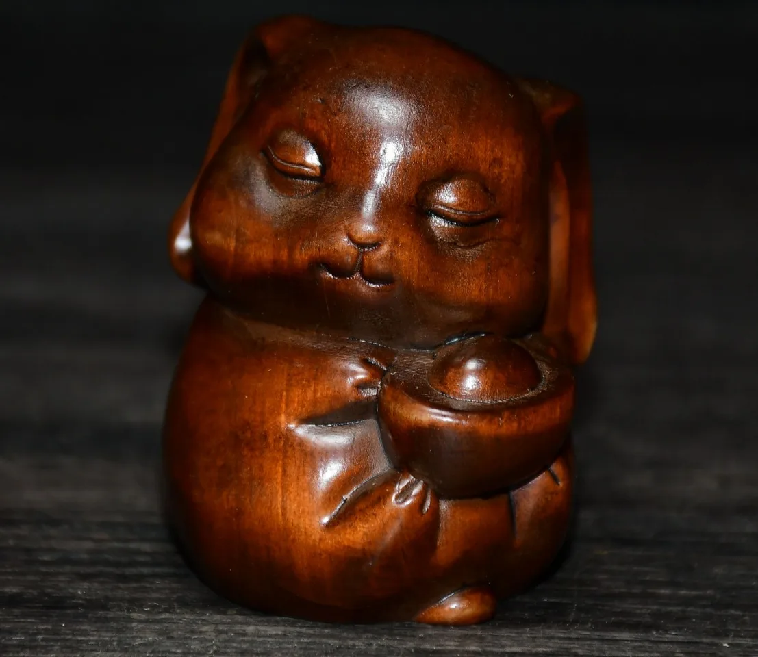 Chinese wood carving small leaf boxwood ingot rabbit piece desk decoration