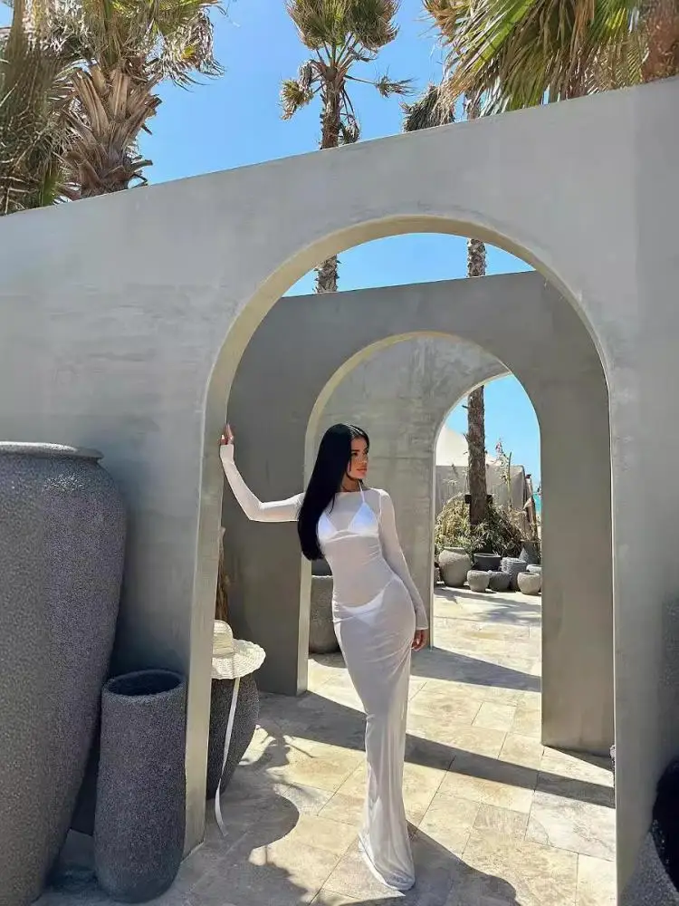 Moda coreana 2025 donna maglia nera elegante abito grembiule da spiaggia sottile primavera estate bianco abito da vacanza a maniche lunghe tendenza popolare