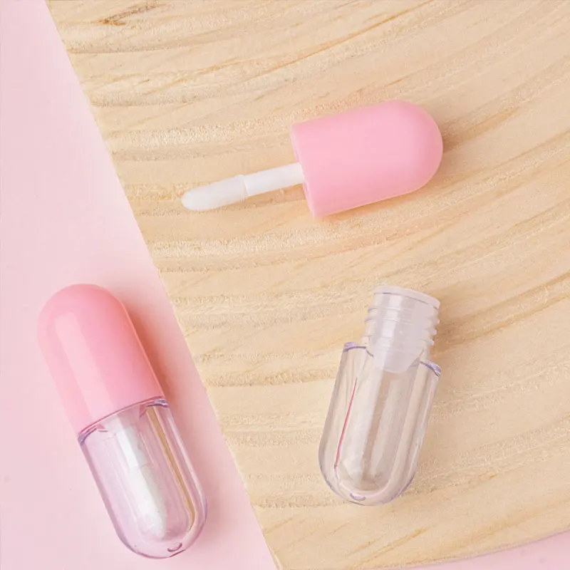 Paquete de 2 botellas dispensadoras de base de maquillaje de 2 ml con cabezal de cepillo, mini botellas dispensadoras de cosméticos en forma de cápsula, envases cosméticos portátiles recargables, artículos esenciales portátiles para viajes