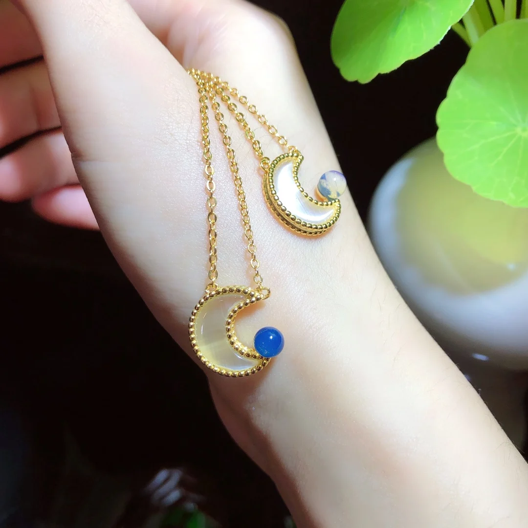 

Pure Silver Setting Natural Dominican Blue Amber Pendant 4mm Round Bead Crescent Moon Core Design