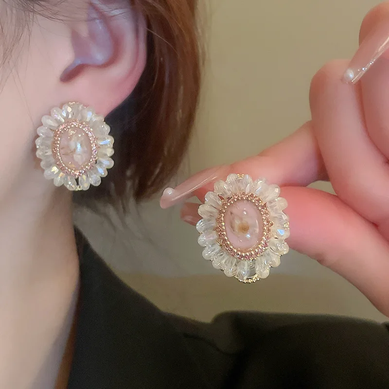 Light luxury diamond-encrusted artificial crystal oval flower silver needle earrings French fashion exquisite temperament