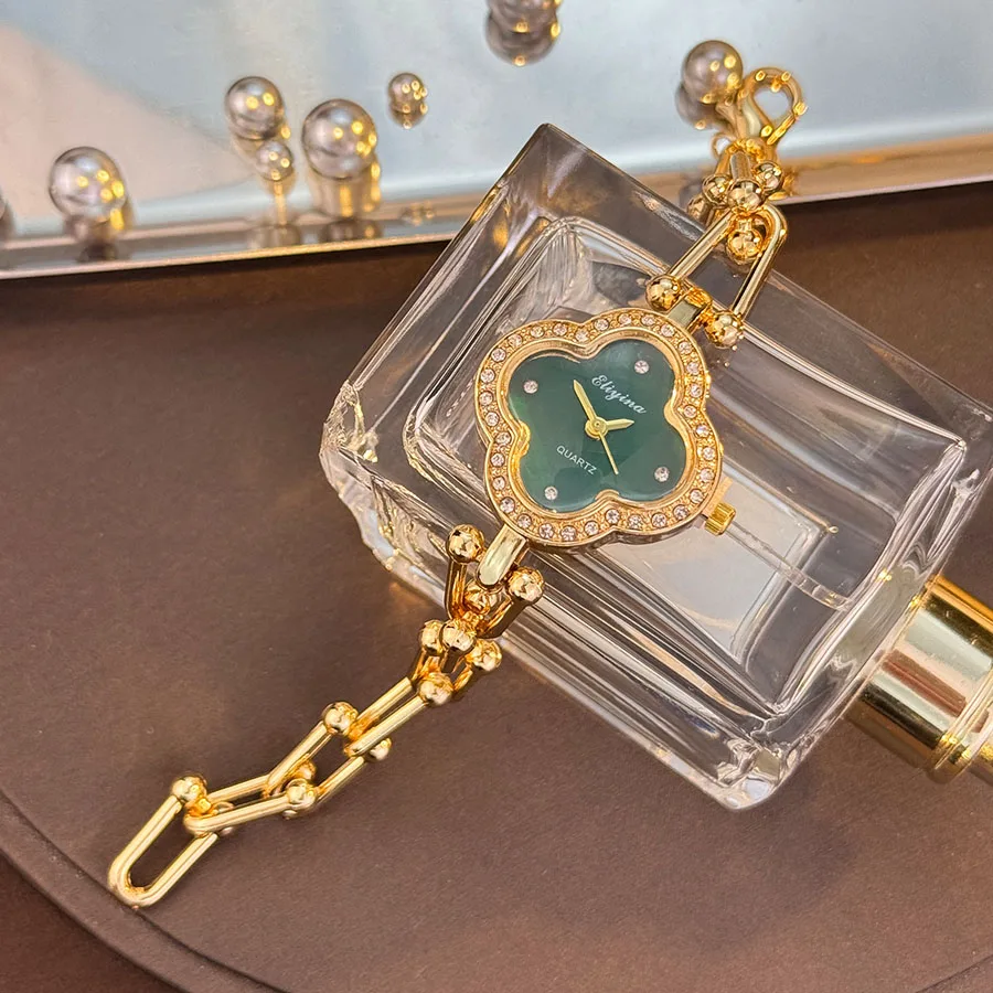 Reloj de cuarzo para mujer a la moda con pulsera de cadena en forma de U DiamondLuxuryReloj de pulsera para mujer con sensación de alta gama y trébol de cuatro hojas