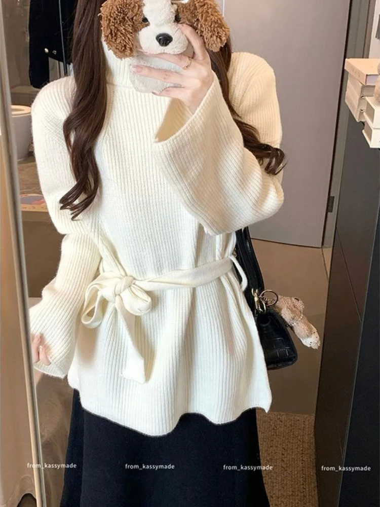 سترة نسائية محبوكة أنيقة جديدة للخريف والشتاء مع خصر دافئ وسترة سميكة ذات ياقة عالية وأكمام طويلة