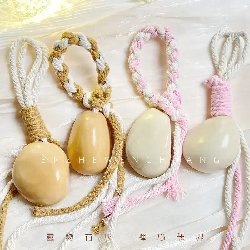 

Natural Ivory Fruit Original Fruit Polished Original Hand Twisted Bodhi Fruit Playing Piece Women‘s with Handlehold Rope for Men