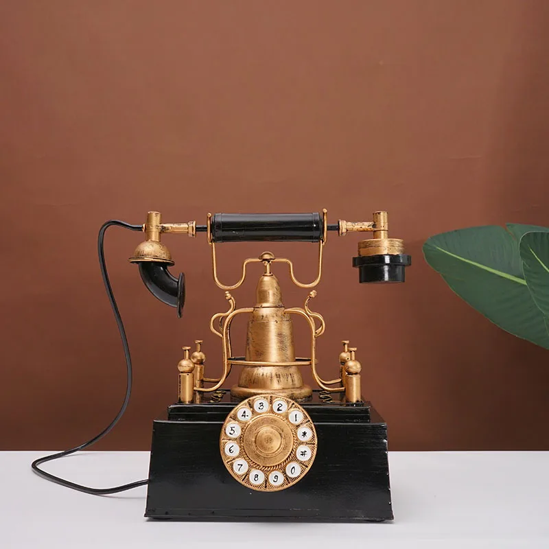Vintage-style wrought iron telephone sculpture handmade desktop decor for restaurant interiors retro aesthetic industrial charm