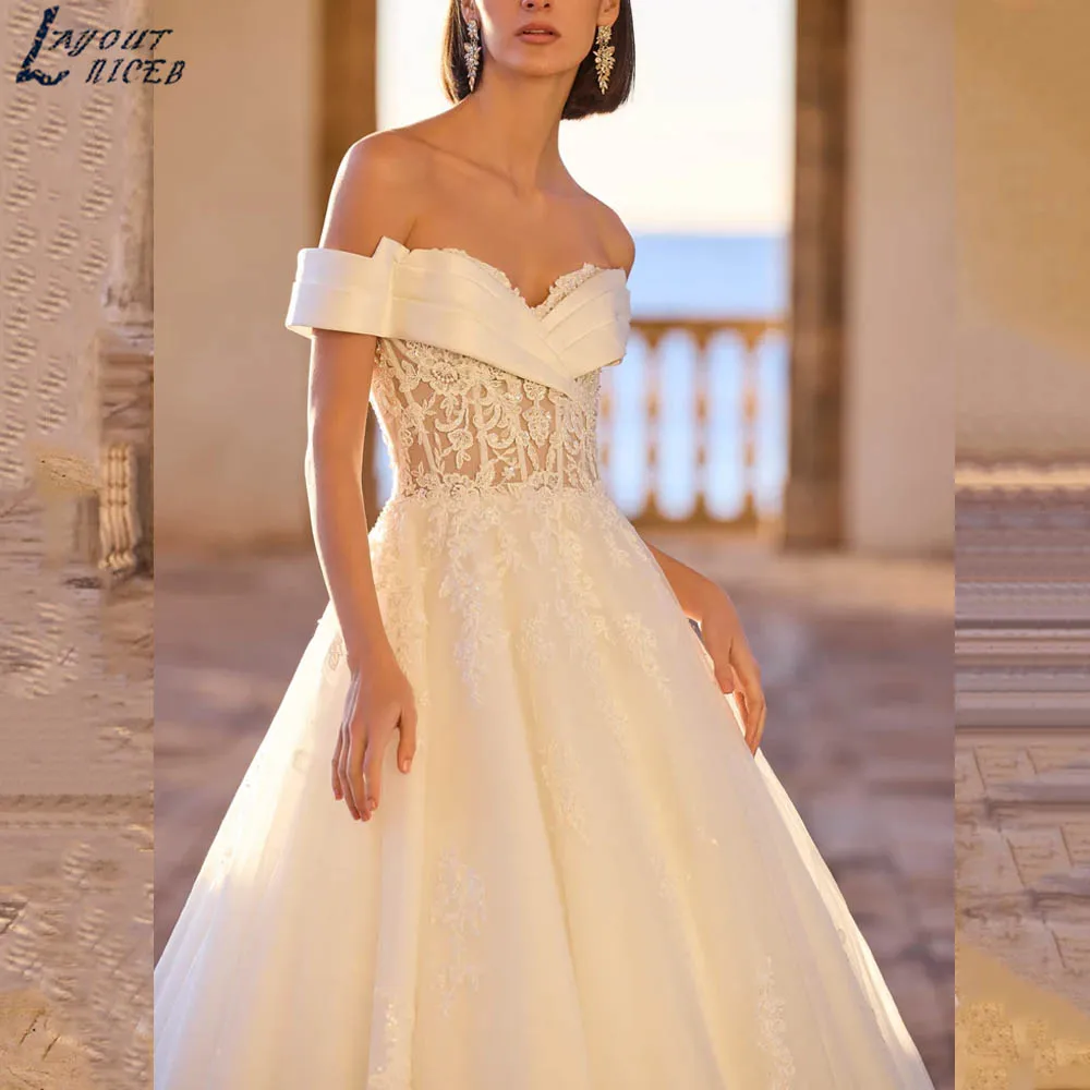 Suknia ślubna o klasycznym kroju, z odkrytymi ramionami, w kształcie litery A, z odkrytymi plecami, aplikacjami, wykwintna suknia dla panny młodej, dekolt w serduszko, tiulowa vestidos de novia, możliwość personalizacji.