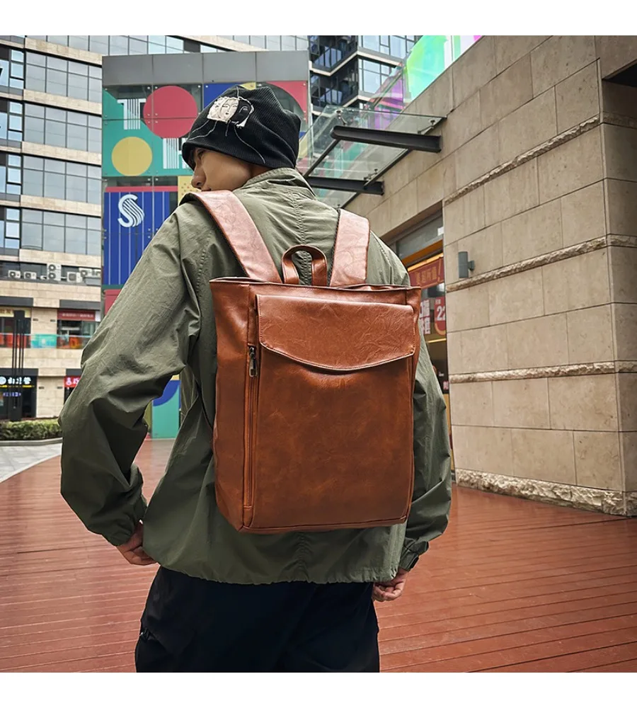 Vintage black leather-style men's backpack anti-splash wear-resistant casual computer bag for daily commuting and work