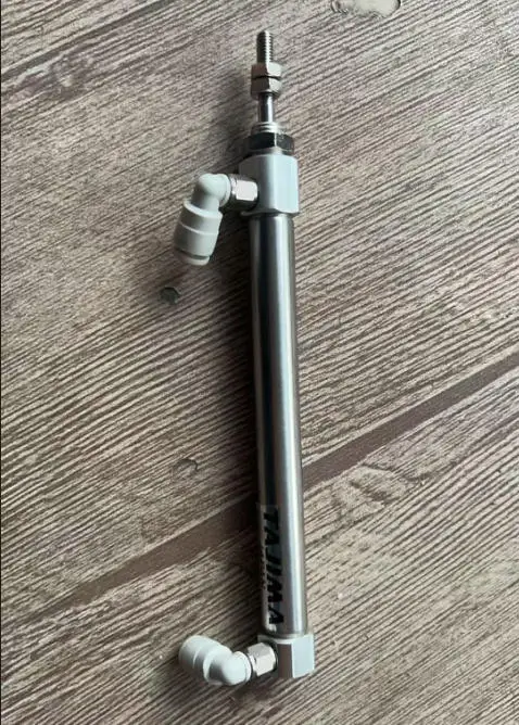 

Высококачественные оригинальные запчасти для вышивальных машин Tajima: Цилиндр для пайеток Tajima (для устройства для пайеток)