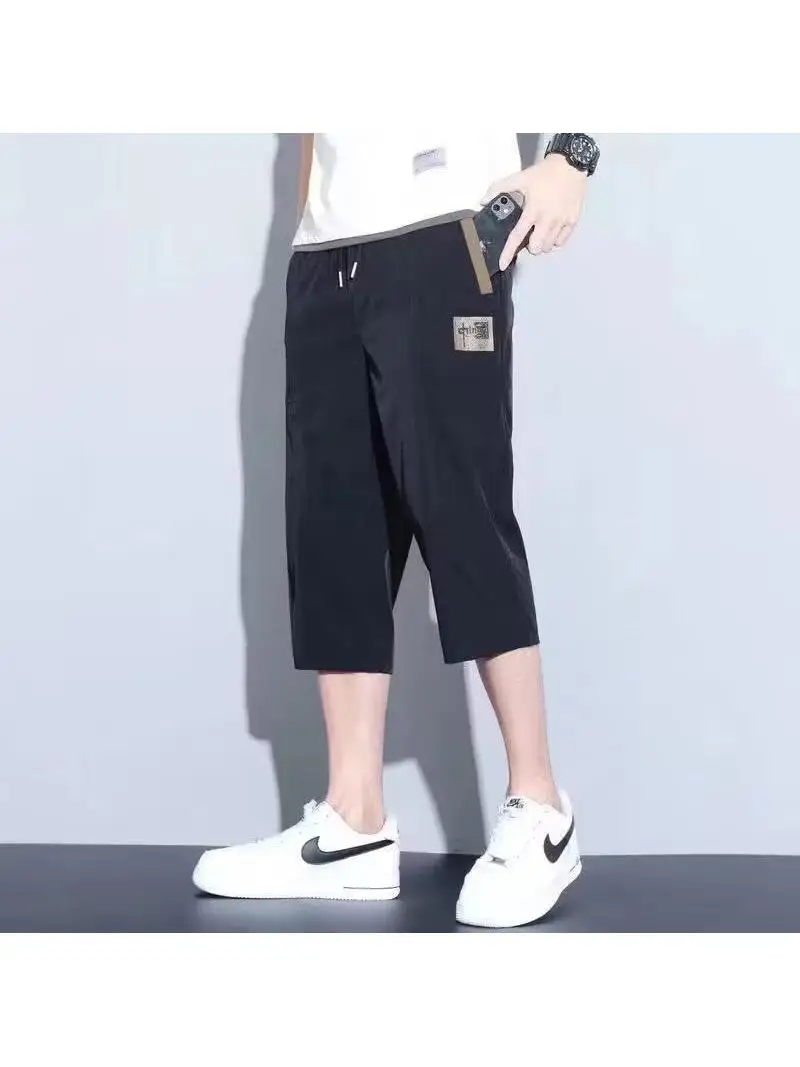 Pantaloni sportivi da uomo larghi in seta di ghiaccio Qui Dry con elastico in vita Gamba dritta Lunghezza sette piedi Sle giovanile e vitale