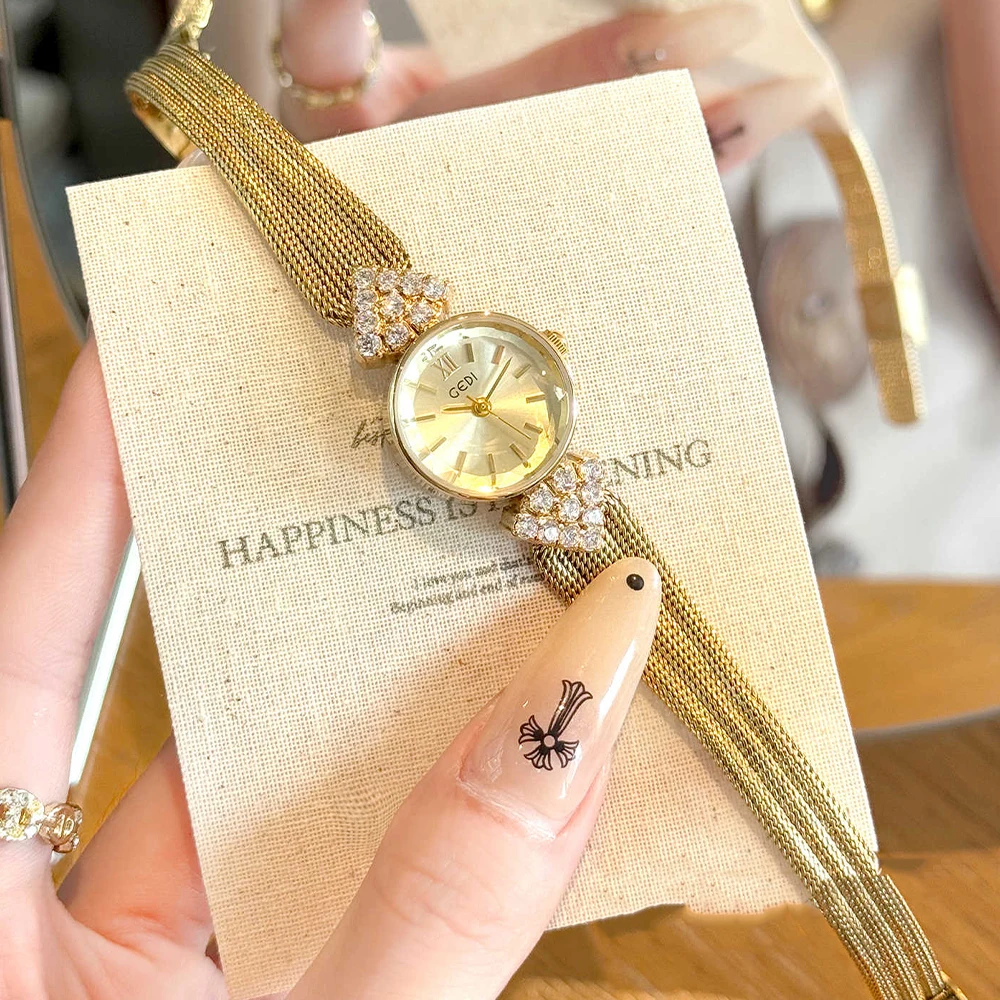 

Часы GEDI, золотые, серебряные, инкрустированные бриллиантами, стальная полоса, женские наручные часы, винтажные нишевые легкие роскошные темпераментные кварцевые часы, женские