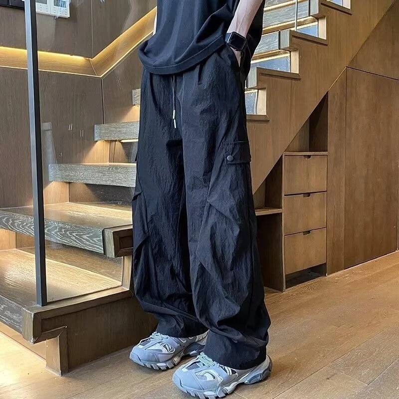 Męskie spodnie robocze szerokie cargo, dresowe, gładkie, tanie, nylonowe, w stylu koreańskim Y2k vintage streetwear, wysokiej jakości.