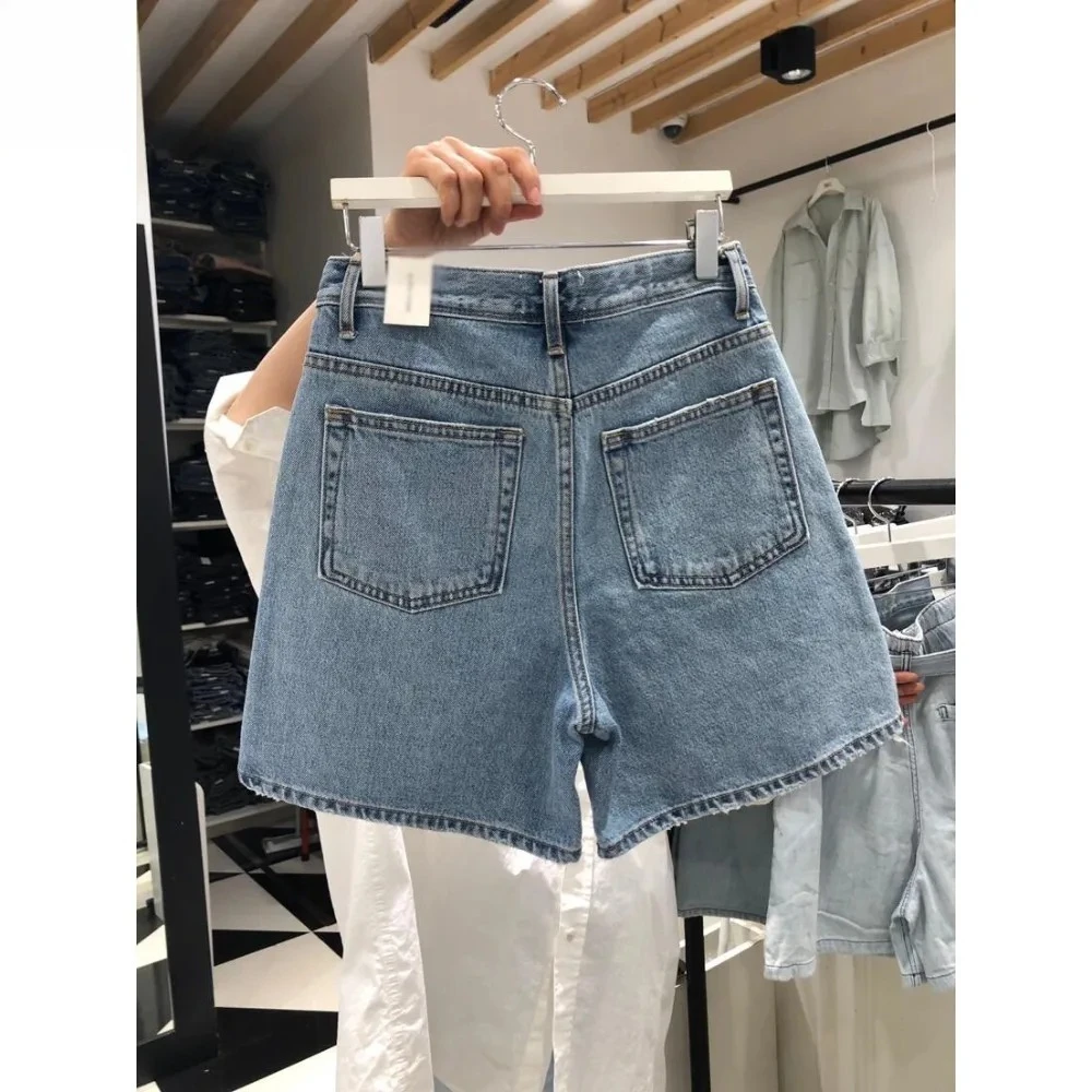 กางเกงยีนส์ขาสั้นทรงสกินนี่ลายการ์ตูนมิกกี้เมาส์ ดีไซน์เก๋ ลดอายุ แฟชั่นใหม่สำหรับผู้หญิง ฤดูร้อน ปี 2025 จากดิสนีย์