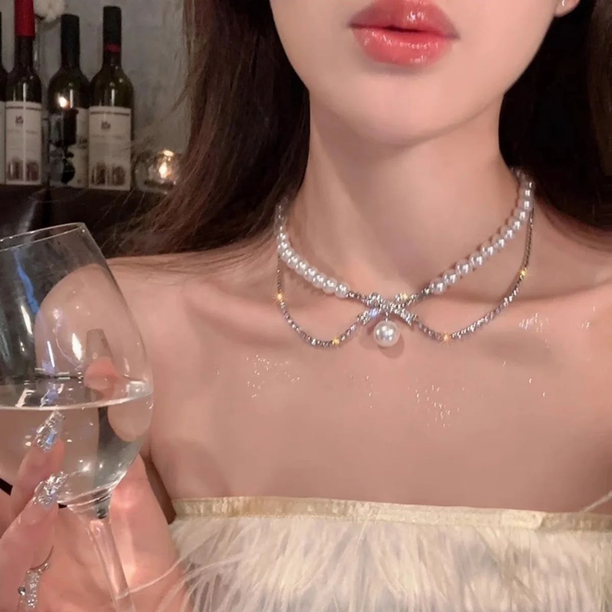 イントレンディなネックレス女性のためのライト高級パールブロークンシルバージルコン蝶鎖骨チェーンファッショナブルなジュエリーアクセサリー 1