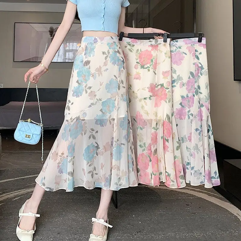 

Summer 2024 New Fragmented Flower Half Skirt Slim and Versatile Wrapped Hip Skirt Mid length Irregular Fishtail Skirt