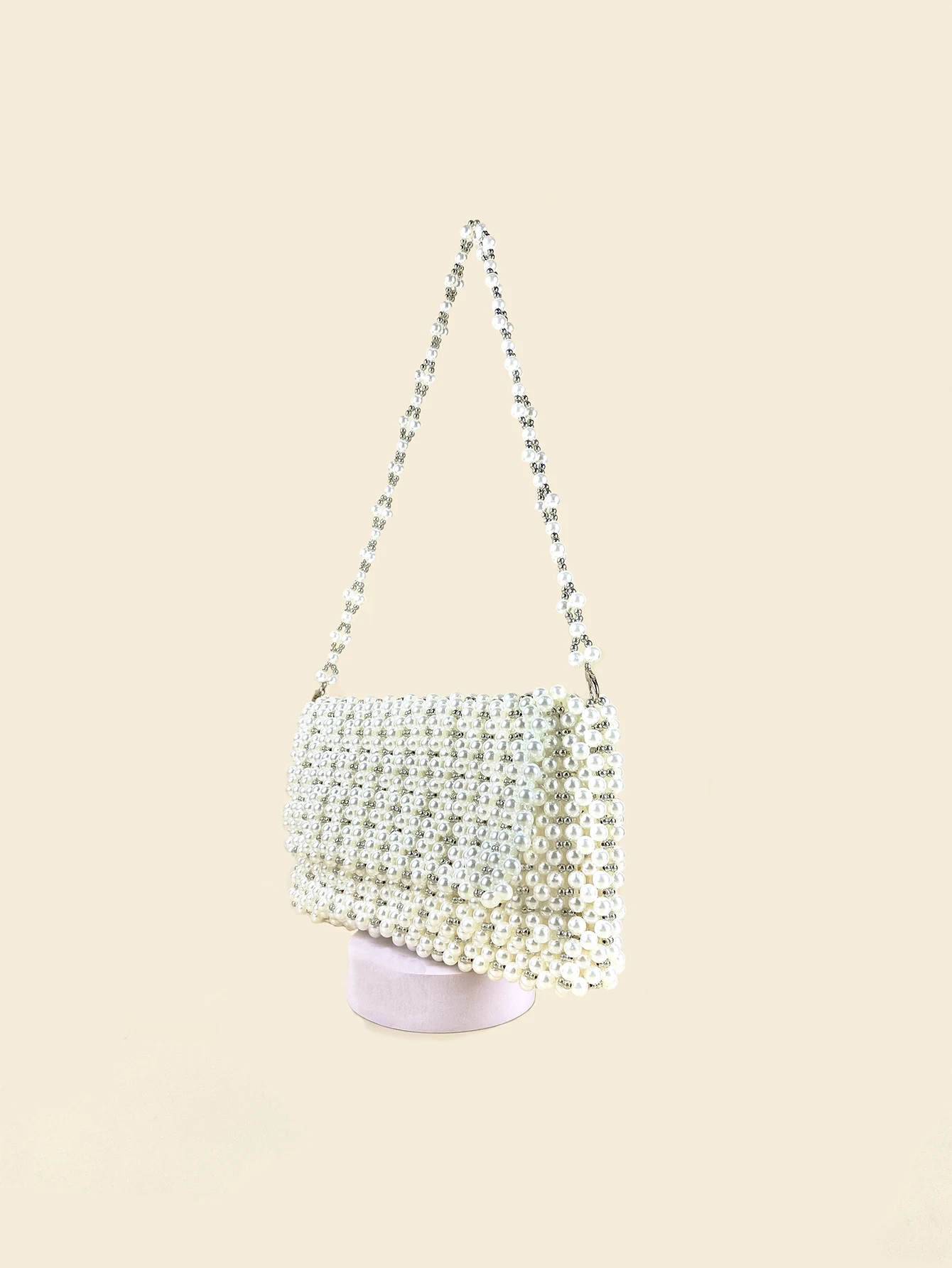 Small and fashionable high-end texture elegant French pearl rhinestone woven beaded hand-held one shoulder banquet bag