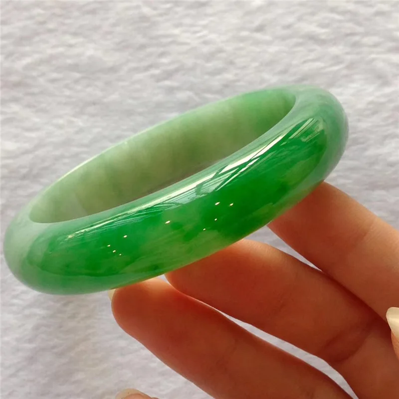 Ice-waxy with hues  imperial round bar  noble jadeite bracelet in bright green