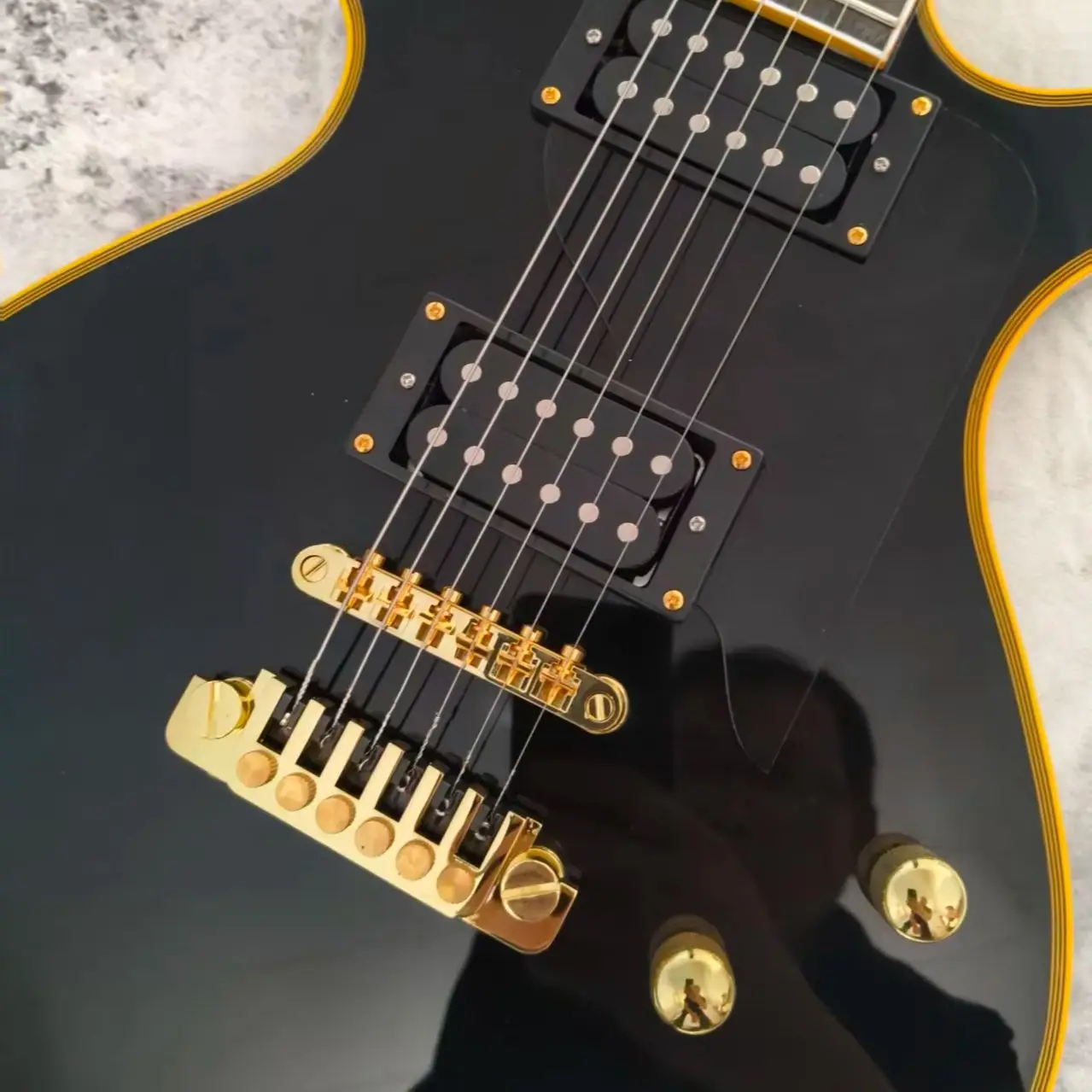 Unique Irregular Shape Solid Body Electric Guitar, Gloss Black Finish, Gold Multi-layer Binding, Dual Humbucker Pickups