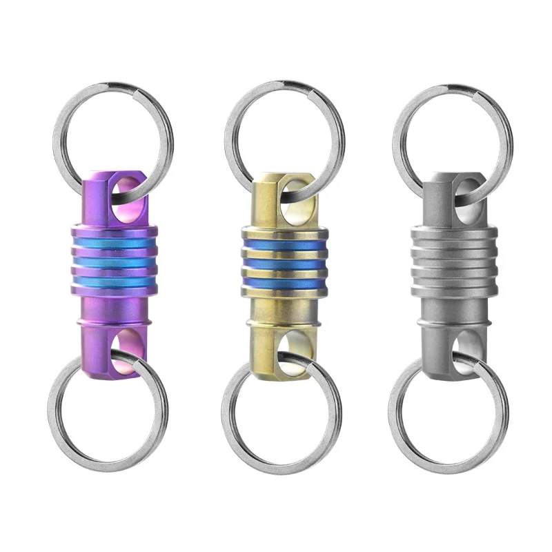 

360 Degree Rotation Man Car Keychain Titanium Alloy Keychain Quick Release Outdoor Multifunctional Tool Creativity Gift