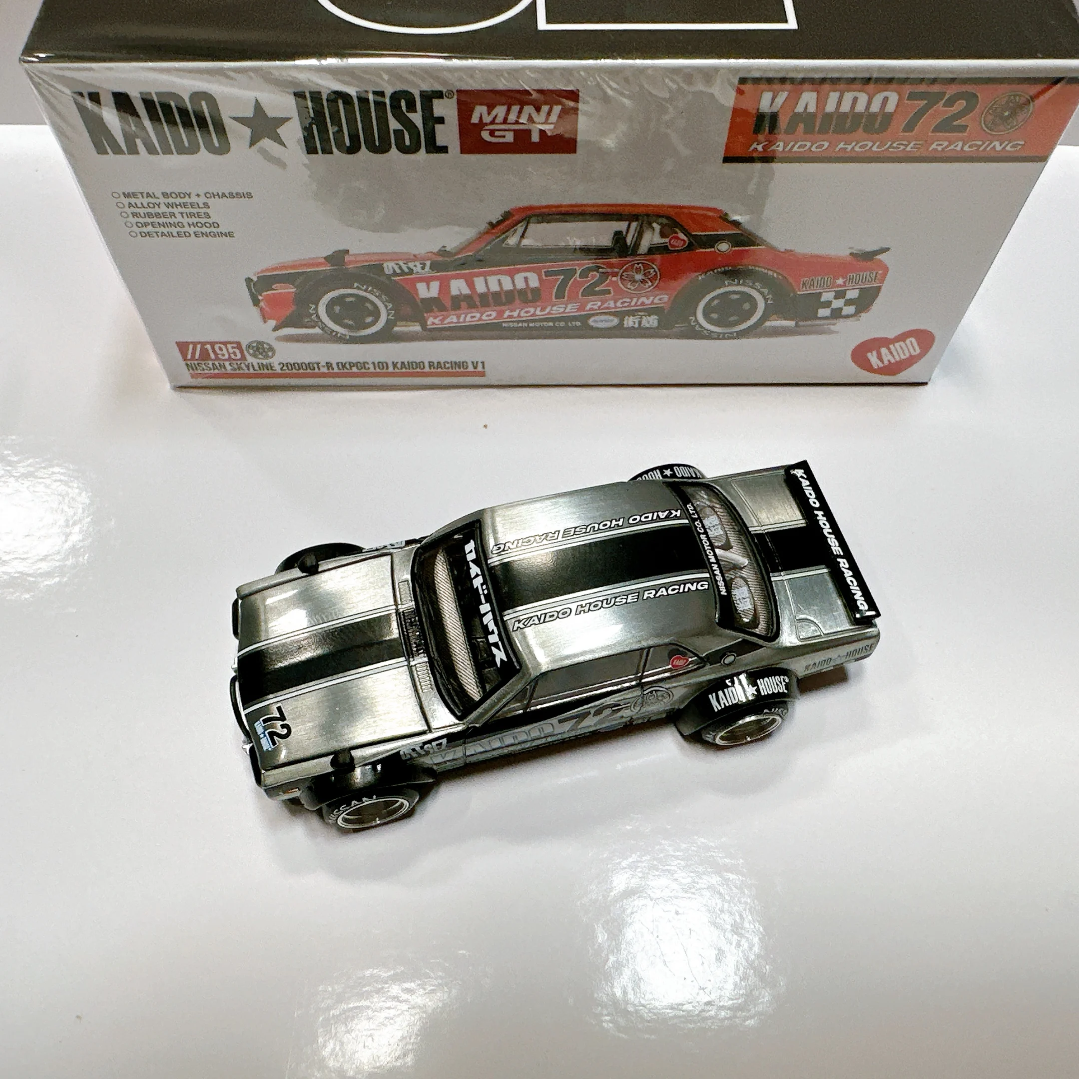 كايدو هاوس 195 *CHASE* 1:64 نيسان سكاي لاين 2000 GT-R KPGC10 كايدو سباق V1 غطاء محرك السيارة القابل للفتح دييكاست موديل سيارة MINIGT KHMG