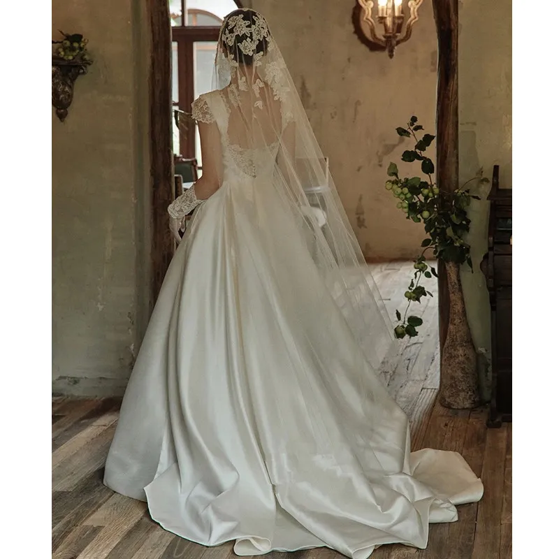 2022 New Design Elegant Boat Neck Wedding Dress Cap Sleeves Soft Satin Korean Vintage A-Line Simple Backless Bridal Gowns 웨딩드레스