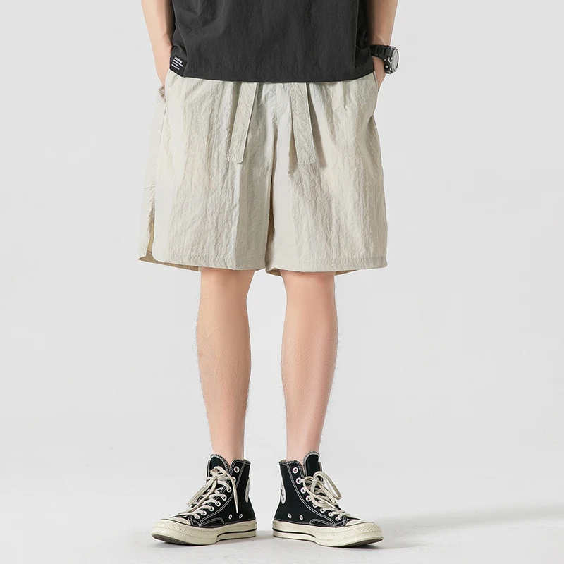 Sommer dünne Modetrend lässige Shorts Herren solide elastische Taille Kordel zug Patchwork Taschen koreanische vielseitige gerade Shorts