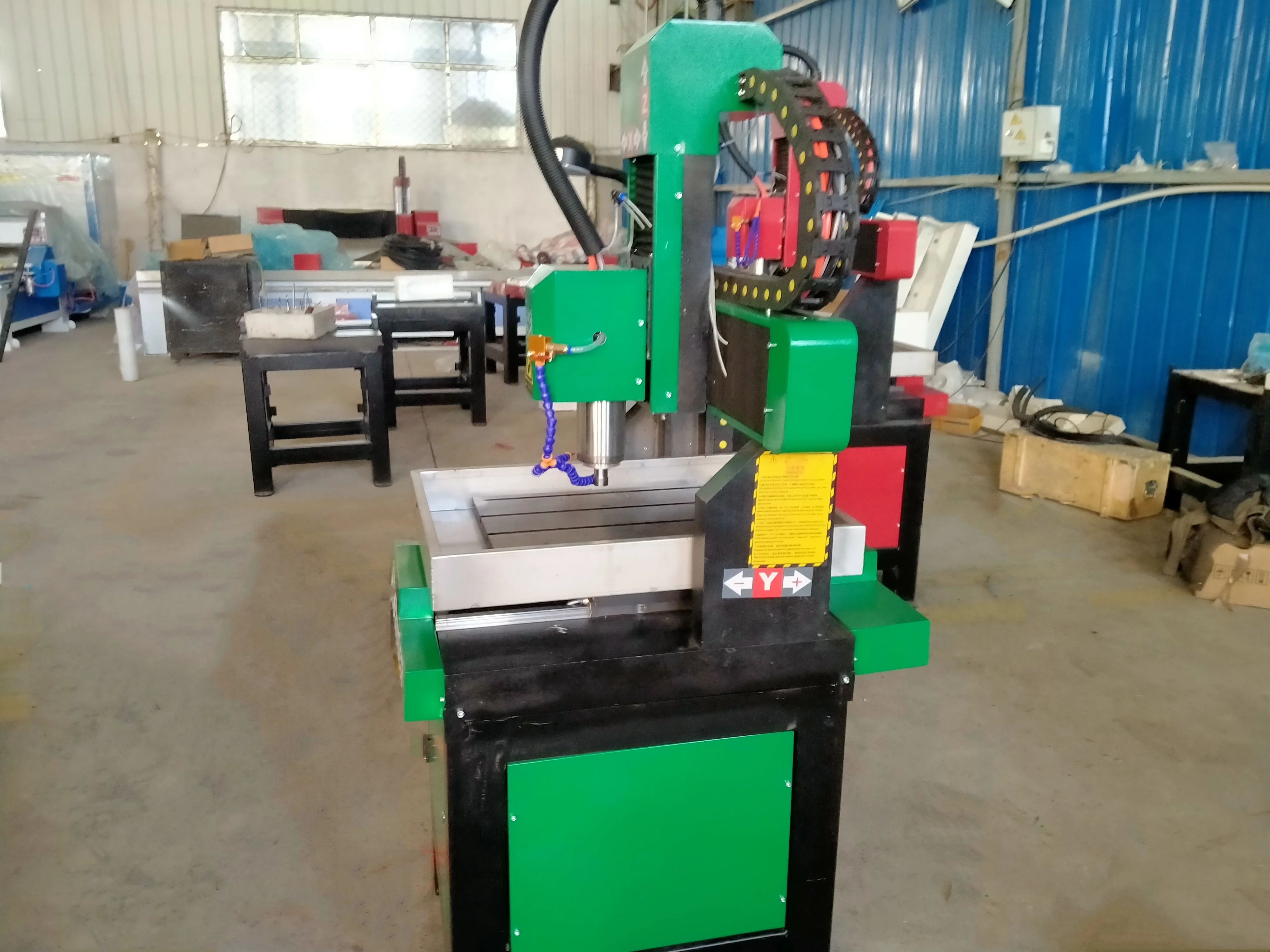 Songli 4040 4 axis jade CNC engraving machine 3D carving machine small cnc router for stone with 1.5kw water cooling spindle
