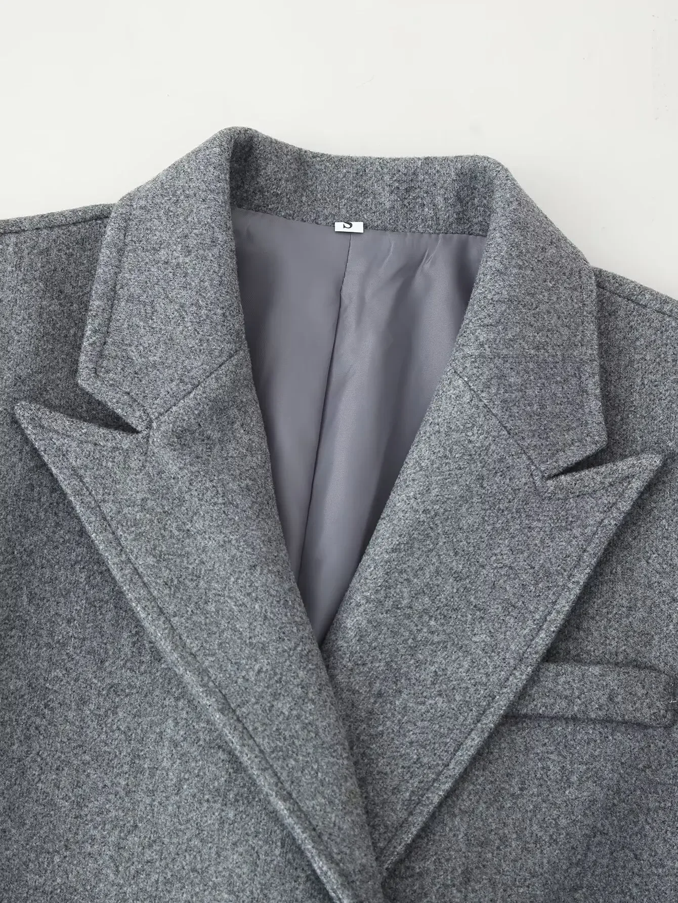 Modischer grauer Wollmantel mit Quasten für Damen, lässiger Revers-Mantel mit langen Ärmeln, doppelreihig, mit Taschen, lockerer langer Mantel, Damen-Outwear für den Alltag. – Detail 25