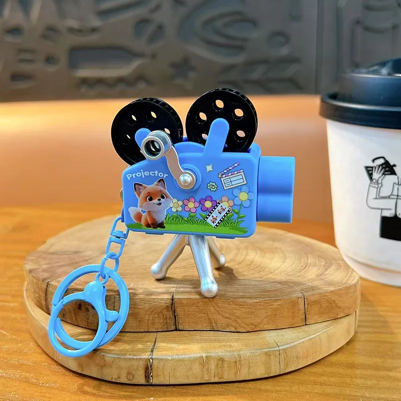 크리 에이 티브 작은 동물 핸드 크랭크 프로젝터 키 체인 귀여운 Schoolbag 장식 펜던트 재미 빛나는 프로젝터 장난감 작은 선물