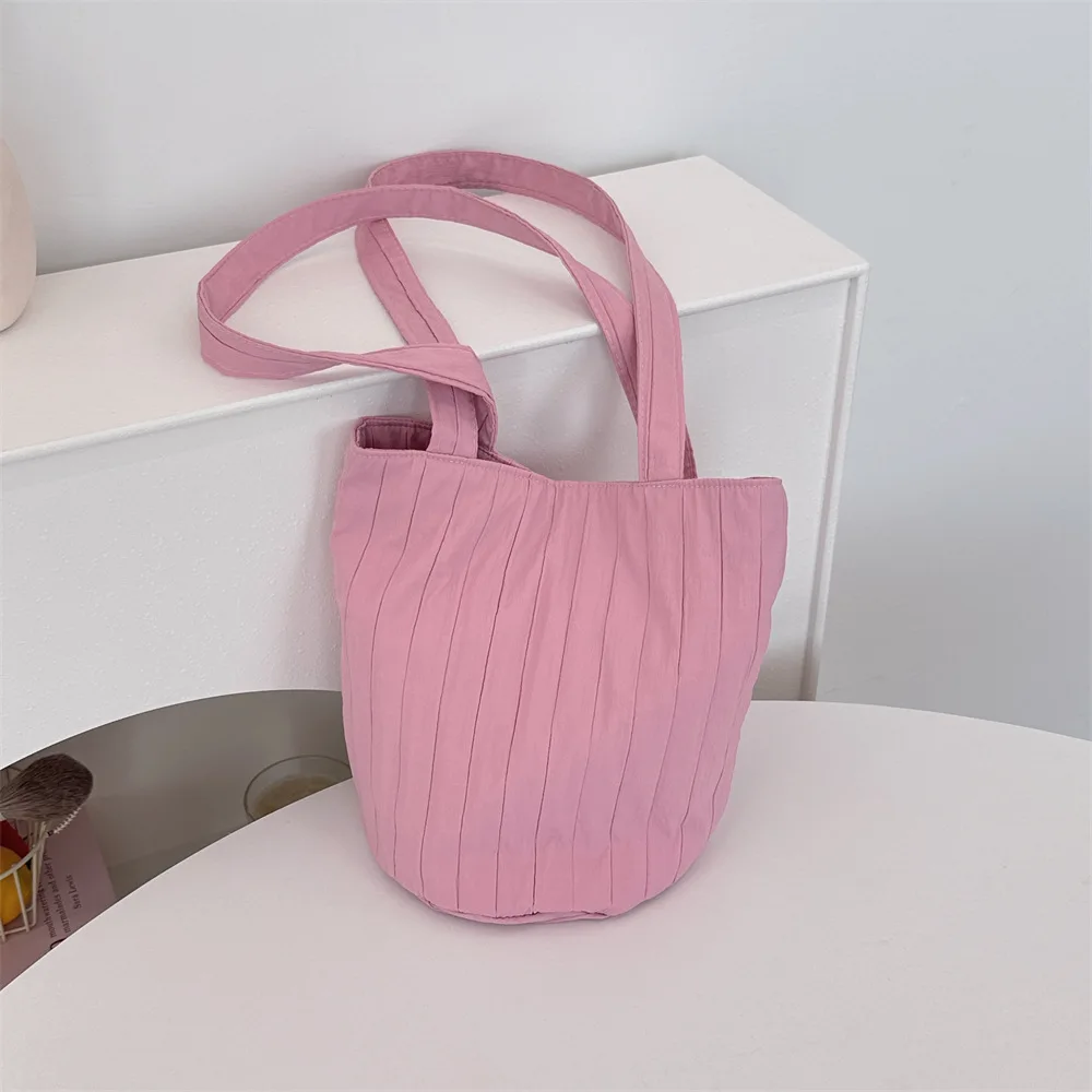 Women's single shoulder striped pleated solid color bucket bag niche minimalist portable handbag