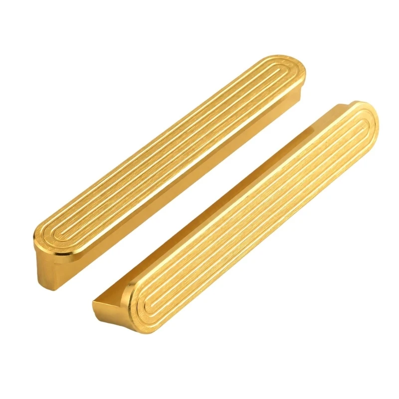 Goldfarbene Schrankgriffe mit einer glatten, abgerundeten Außenform 3XUF – Detail 1