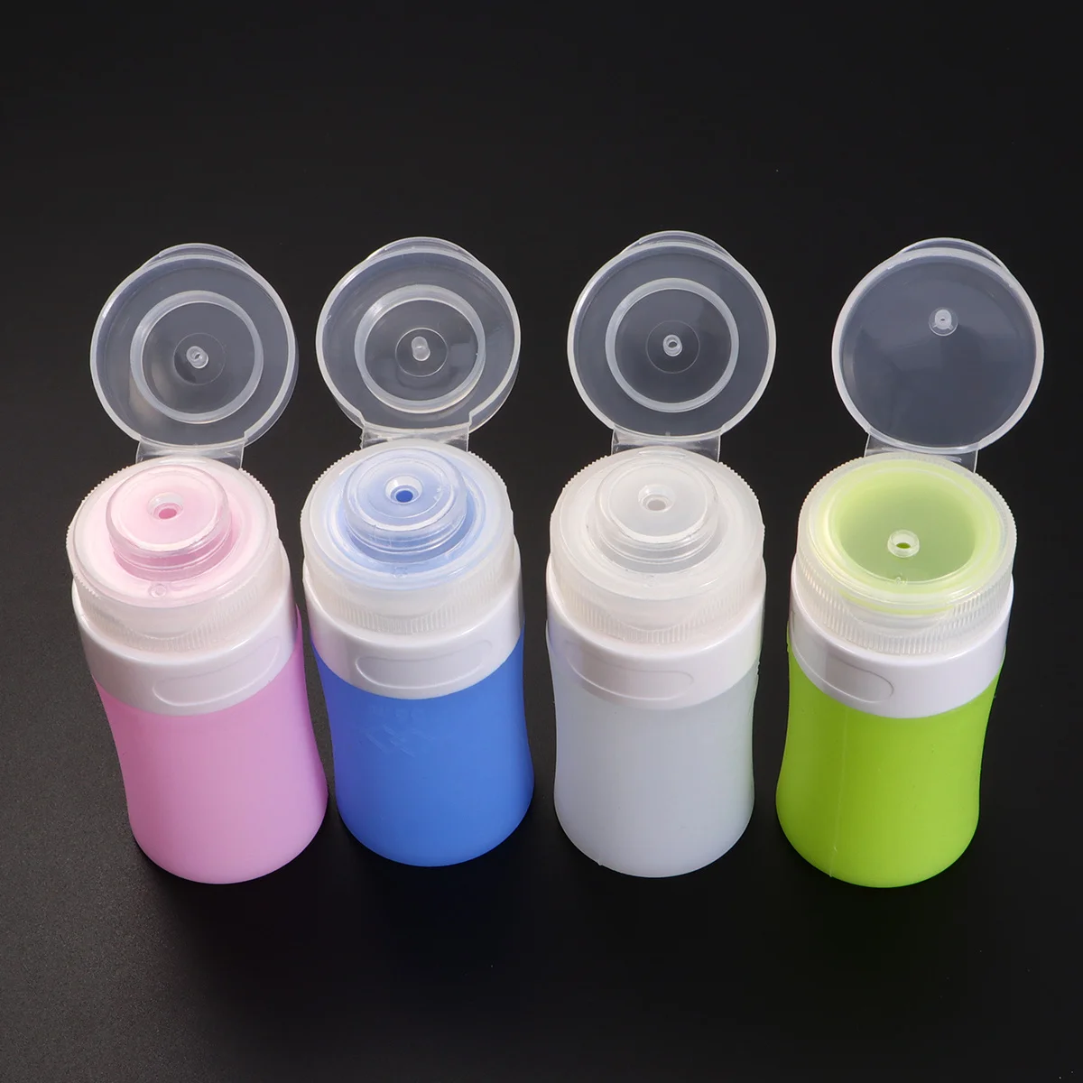 

4Pcs Silicone Bottles Leakproof Travel Containers Mini Portable Empty Lotion Bottles 38Ml Set Pink Green White Blue