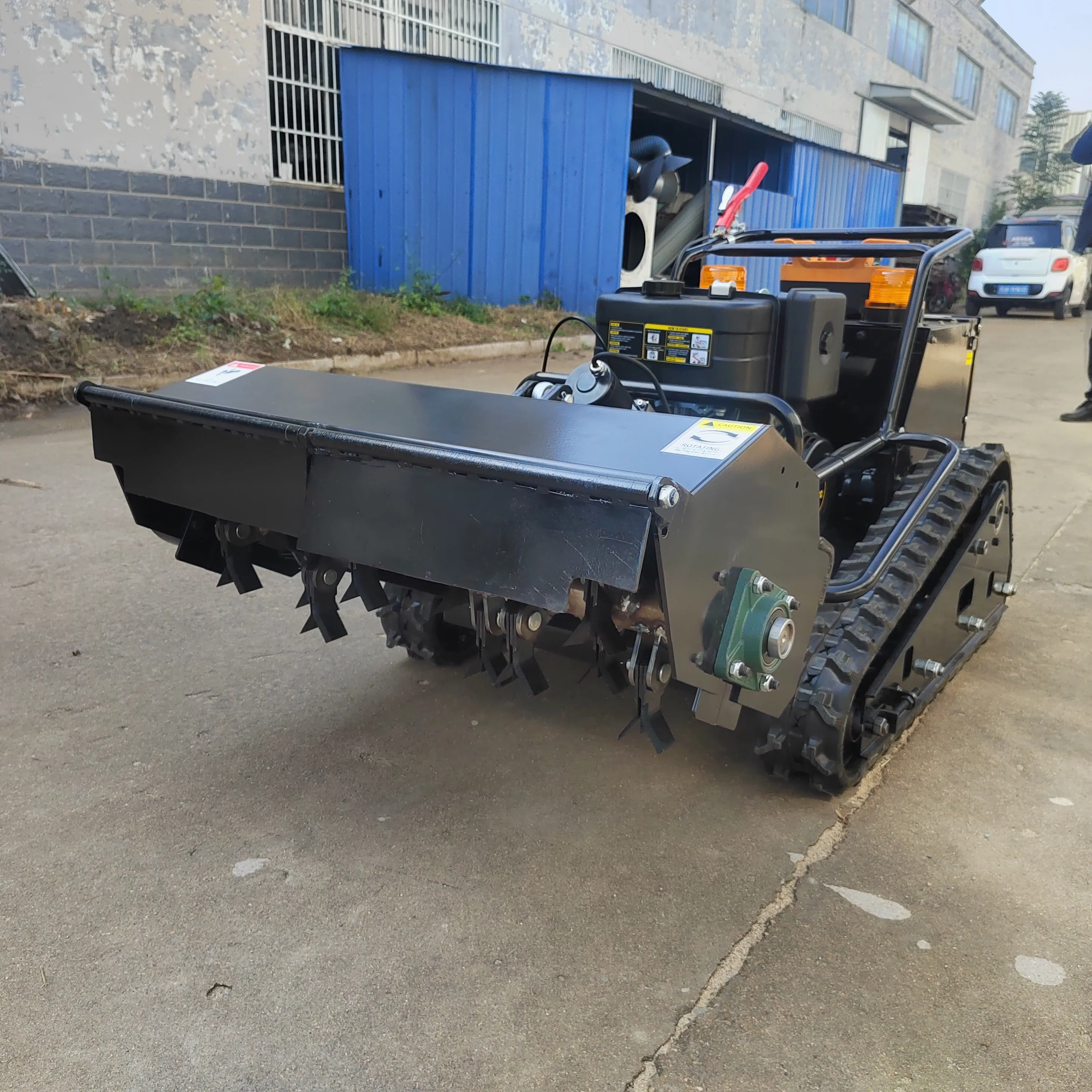 หุ่นยนต์กําเนิด CE EPA ระบบใหม่ตัวควบคุมอุตสาหกรรมเครื่องตัดหญ้าอัตโนมัติรีโมทคอนโทรลเครื่องตัดหญ้าตีนตะขาบ