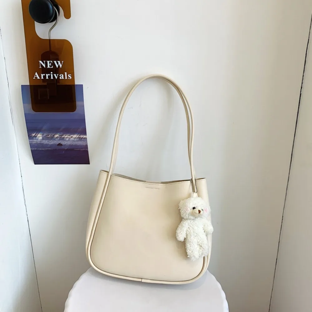 

Popular Korean Style PU Leather Shoulder Bag Solid Color Large Capacity Underarm Bag Soft with Bear Pendant Tote Bag Casual