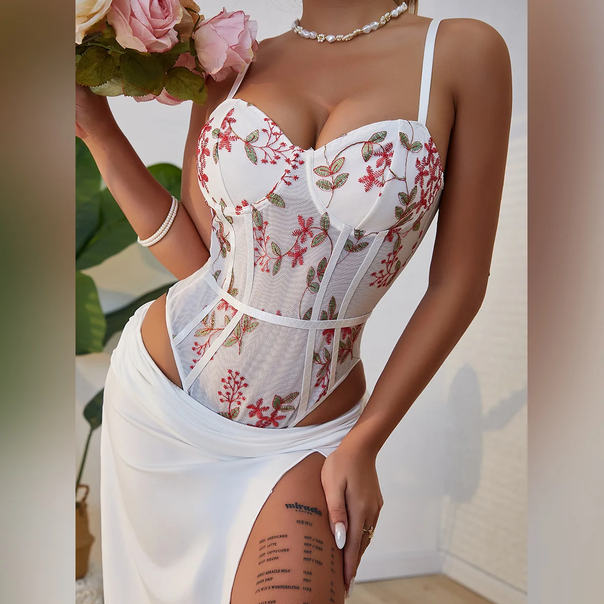 

In The Summer of 2025, The New Fashion Women's Embroidery Sticker Steel Ring Fishbone Chest Joker Suspender Jumpsuit Ms