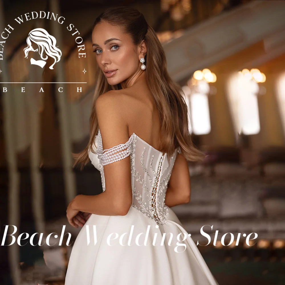 Beach Off-Shoulder Sweetheart Neckline ภาพลวงตาเอว High Slit ชุดเจ้าสาวพร้อมรถไฟ Elegant Modern ชุดแต่งงานที่กําหนดเอง