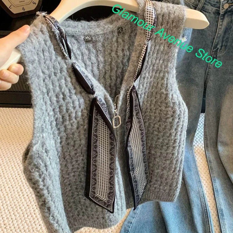 Korean V-neck knitted fashion sleeveless vest sweater women's autumn and winter new high-grade loose stacked top with silk scarf
