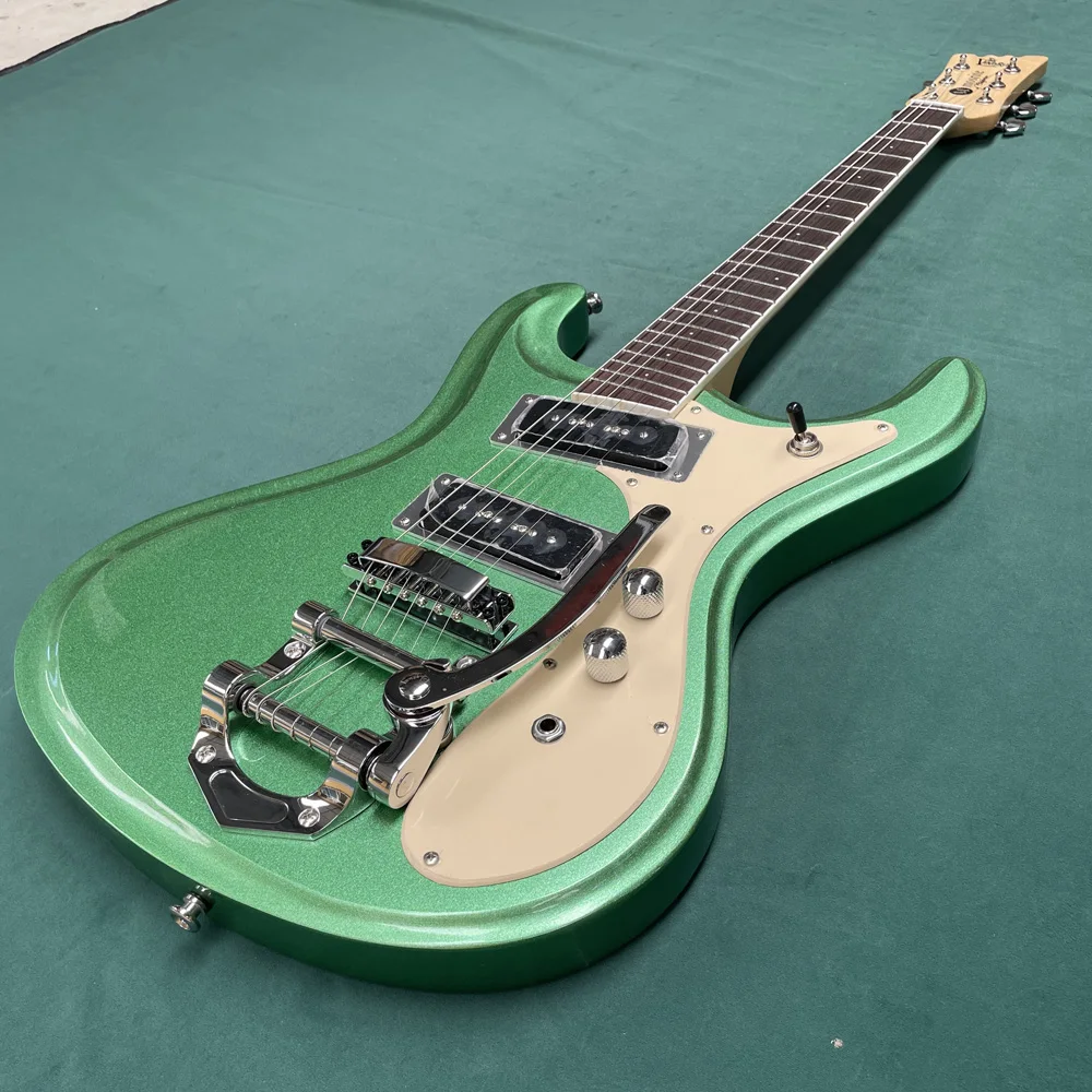 Green 6-string electric guitar, with high gloss finish, guitar solo, vibrato pedal guitar, foot-shaped headstock